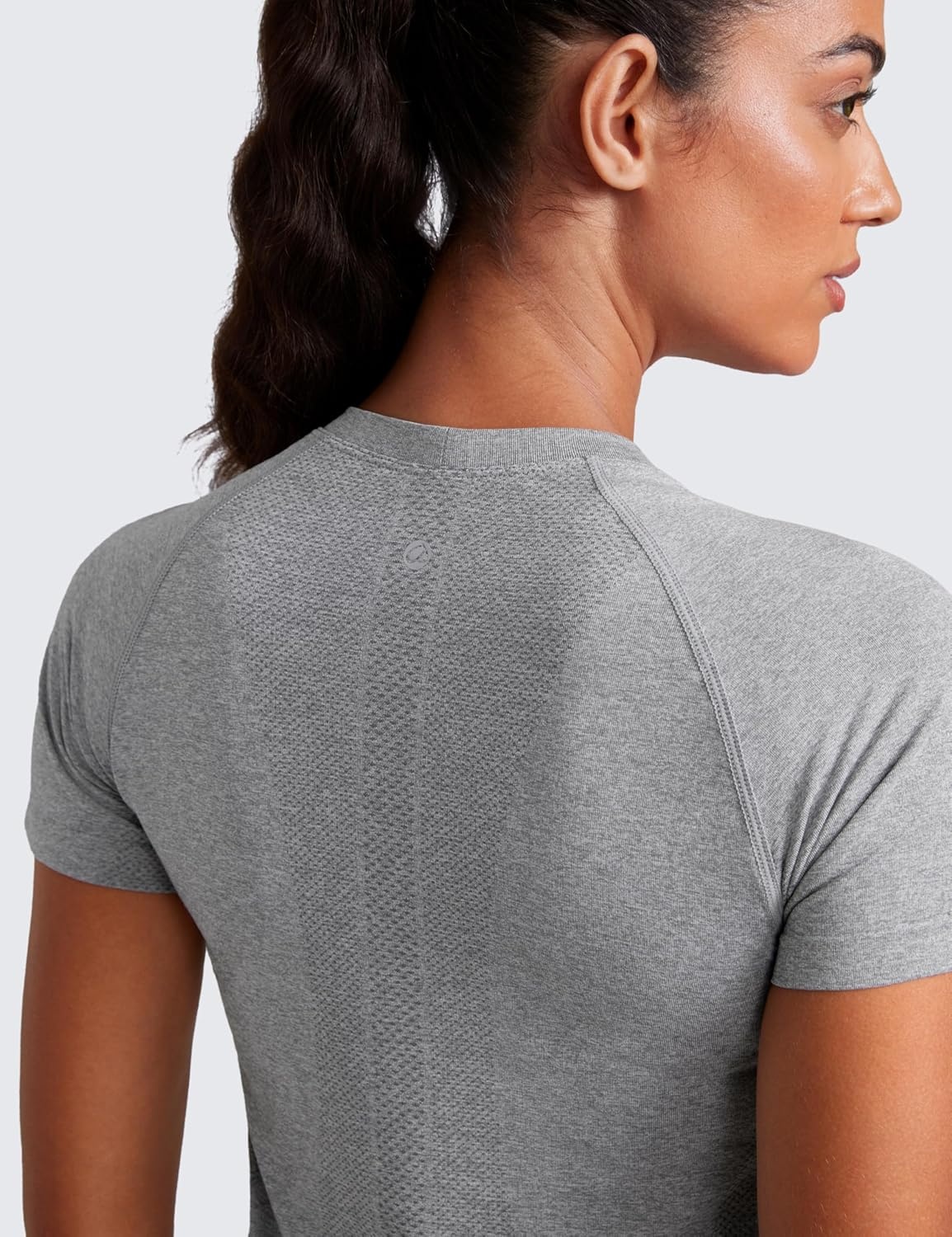 image:imageCRZ YOGA Seamless Workout Tops for Women Waist Length Running Gym Athletic Yoga Short Sleeve Shirts Breathable CrewneckSlate Grey Marl