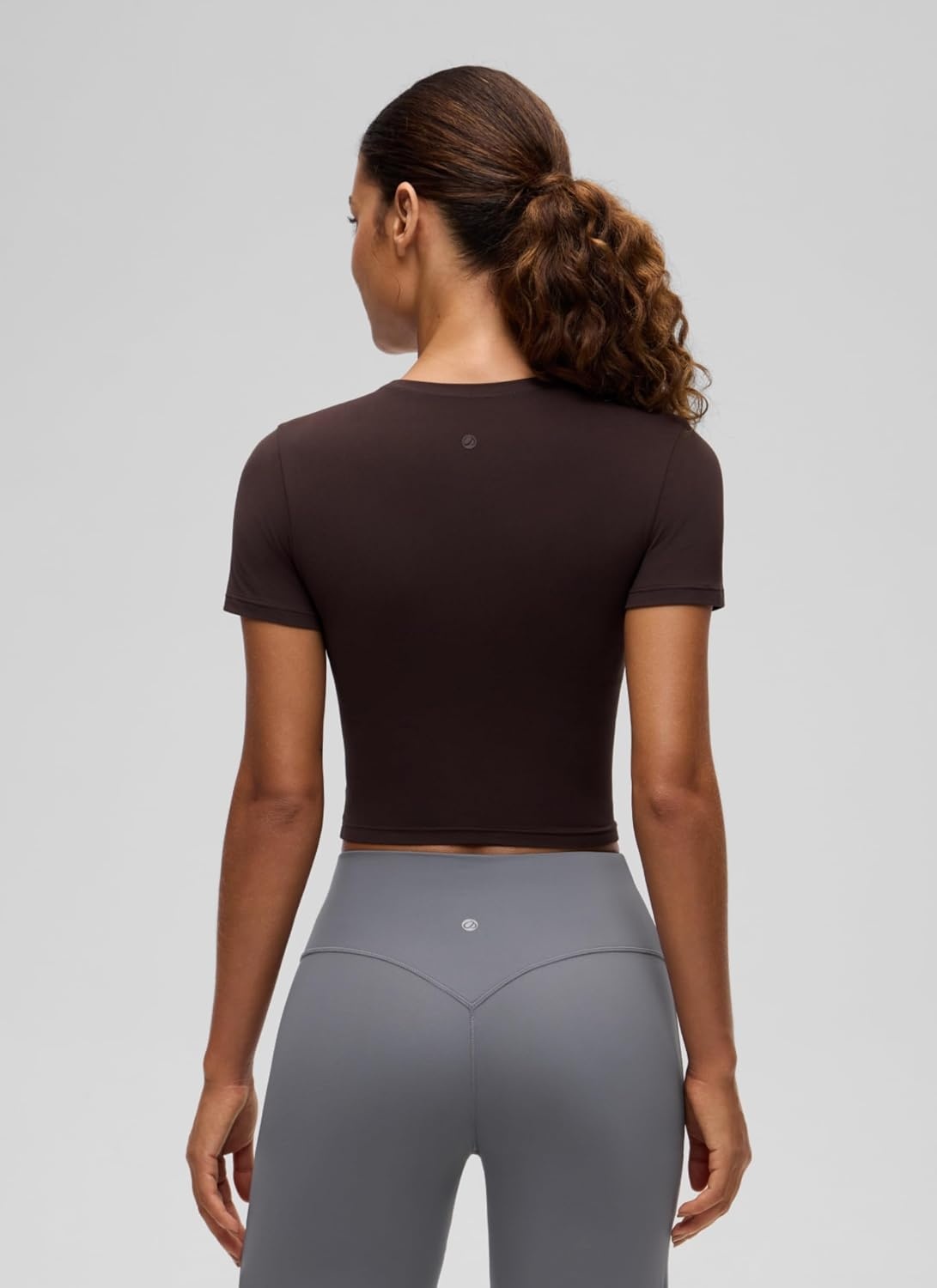 image:imageCRZ YOGA Softembrace Crewneck Crop Tops for Women Workout Casual Going Out Soft Short Sleeve Shirts Basic Fitted Baby TeesHot Fudge Brown
