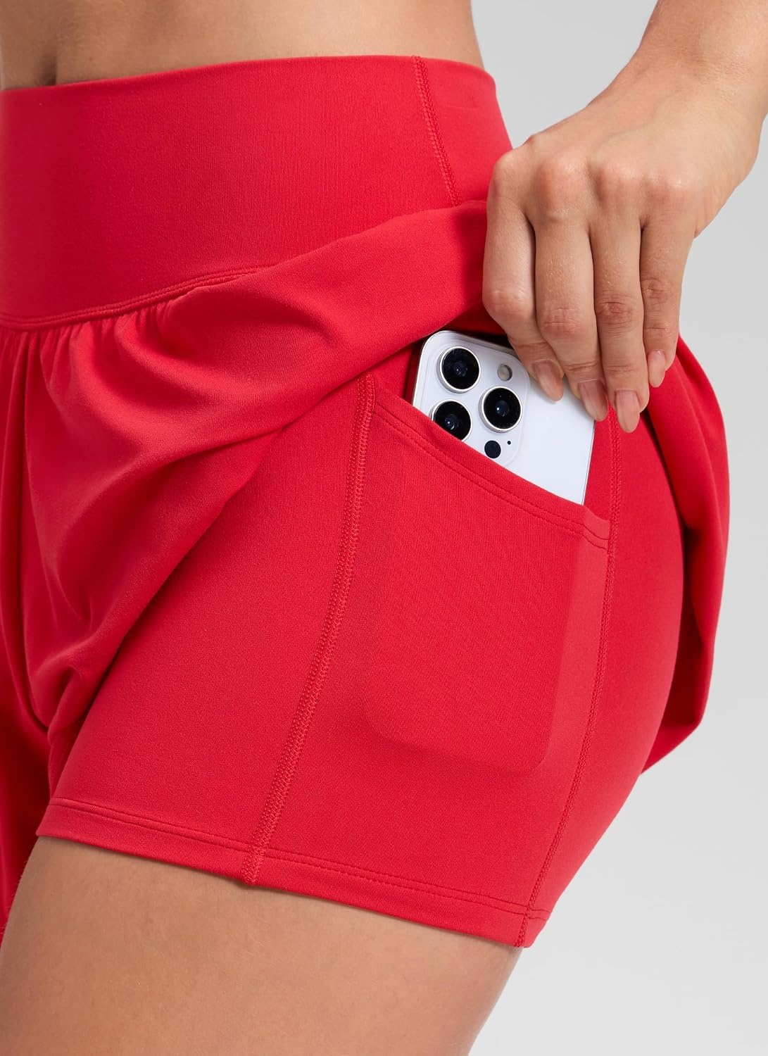 image:imageCRZ YOGA Softretch 2 in 1 Flowy Shorts for Women High Waisted Causal Yoga Lounge Workout with PocketsAurora Red