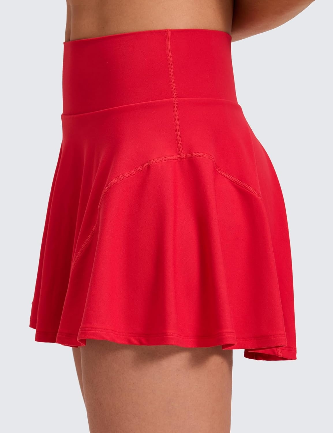 image:imageCRZ YOGA Softretch Flowy Pleated Tennis Skirts for Women High Rise Mini Golf Casual Skort with Inner Shorts Side PocketsAurora Red