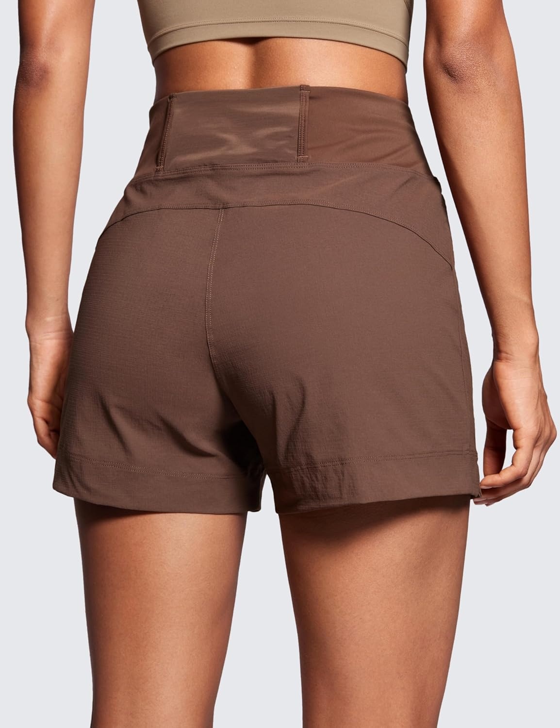 image:imageCRZ YOGA Womens Lightweight Mid Rise Hiking Shorts 4 Stretch for Athletic Summer Travel Outdoor Golf with Zip PocketsCoffee Brown