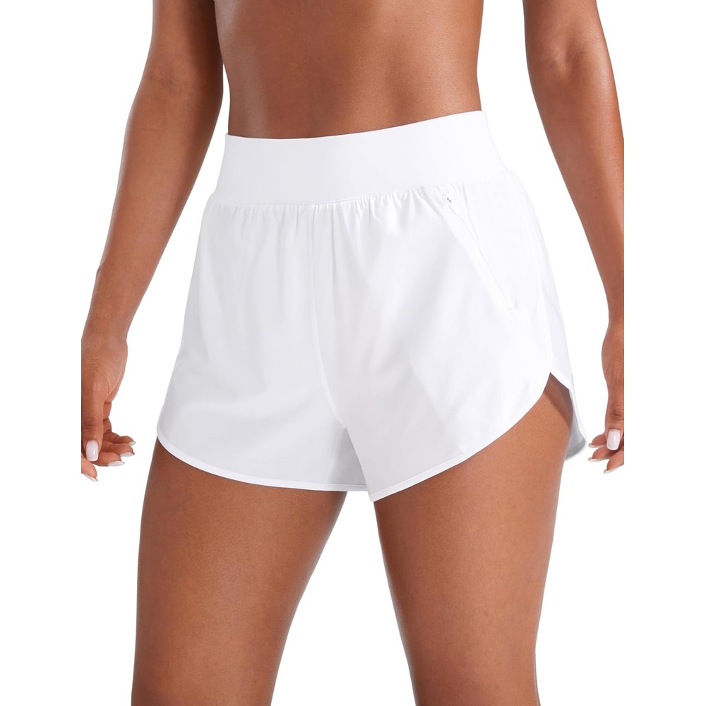 image:imageCRZ YOGA Dolphin Flat Waist Athletic Shorts for Women 3 High Rise Quick Dry for Running Workout Gym Track with Zip PocketsWhite