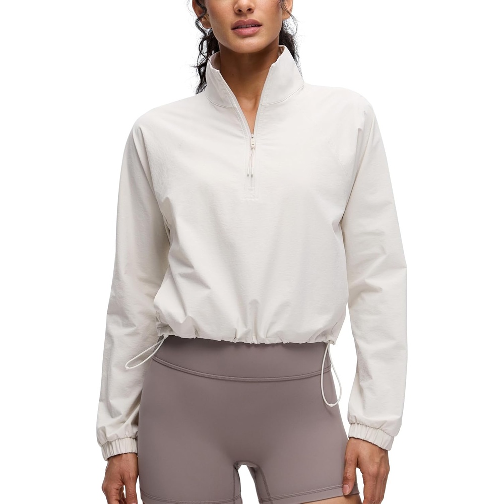 image:imageCRZ YOGA Drawstring Bottom Workout Jackets for Women Half Zip Pullover Cropped Workout Outdoor Tops with PocketsMilky White Bone