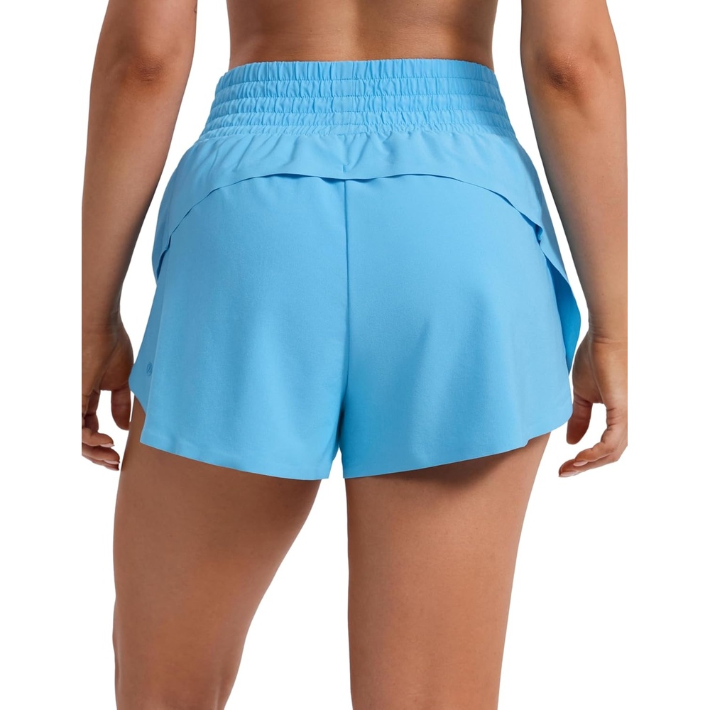 image:imageCRZ YOGA Split Dolphin Running Shorts for Women 25 Curved Back High Waisted Quick Dry for Athletic Workout Gym TrackKayak Blue
