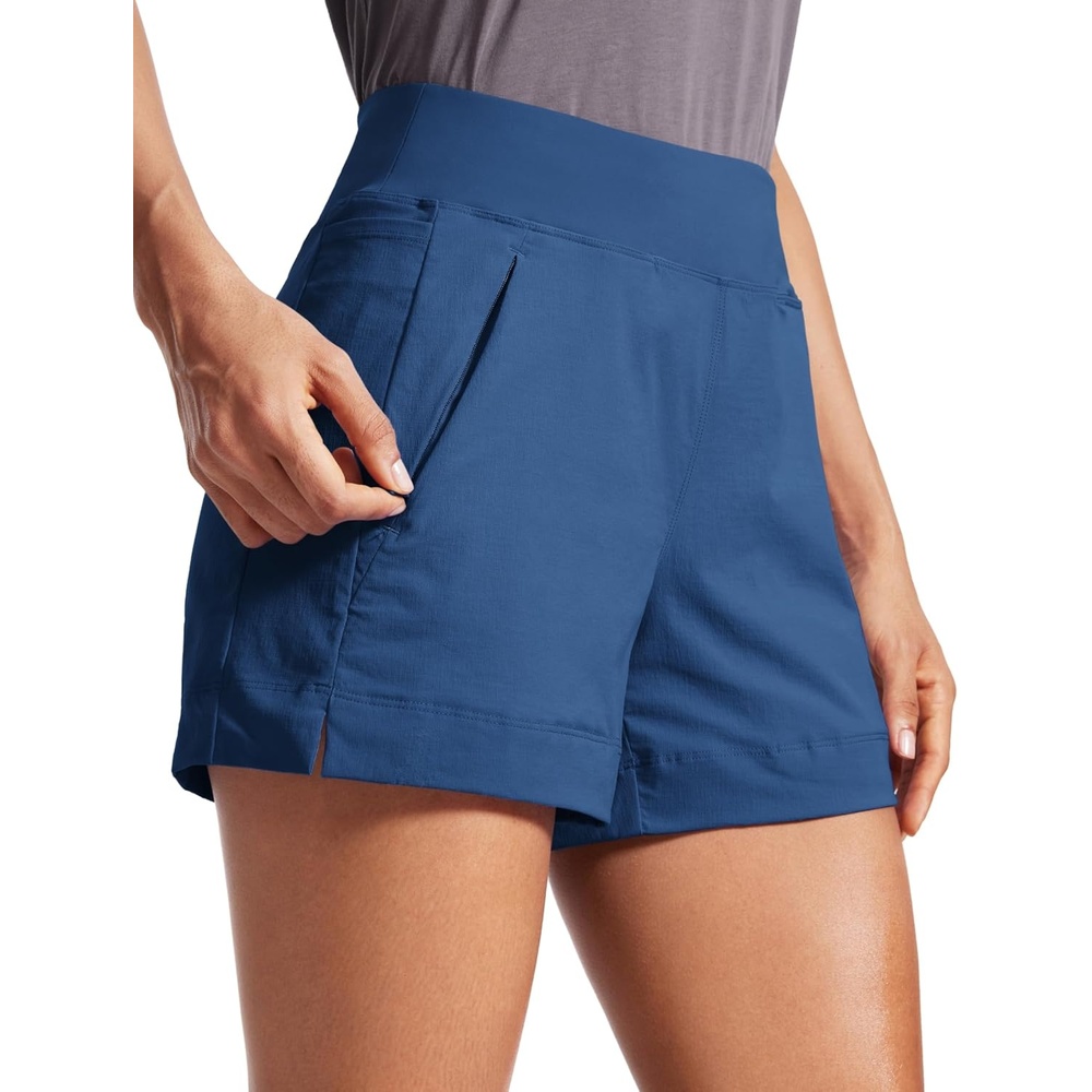 image:imageCRZ YOGA Womens Lightweight Mid Rise Hiking Shorts 4  Stretch for Athletic Summer Travel Outdoor Golf with Zip PocketsPitch Blue