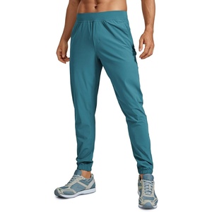 CRZ YOGA Athletic Joggers for Men 29″ – Lightweight Running Training Pants with Zip Pockets and Ankle Zippers(Washed Blue)