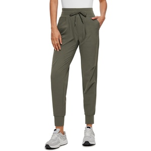 CRZ YOGA Athletic Joggers for Women 27.5″ – Lightweight Travel Outdoor Hiking Pants with Pockets(Light Army Green)
