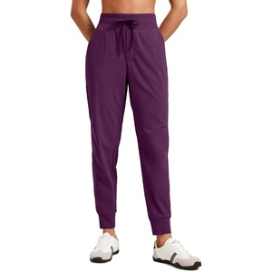 CRZ YOGA Athletic Joggers for Women 27.5″ – Lightweight Travel Outdoor Hiking Pants with Pockets(Plum Magenta)