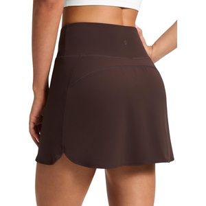 CRZ YOGA Butterluxe Dolphin High Waisted Golf Skirts for Women – Mini Bodycon Casual Vacation Skort with Built-in Shorts(Hot Fudge Brown)