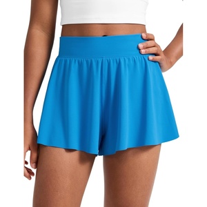 CRZ YOGA Girls 2 in 1 Athletic Flowy Shorts – Dance Tennis Soccer Casual Butterfly Skirts Liner Pockets Kids Teen(Madagascar Blue)