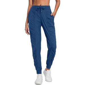 CRZ YOGA Lightweight Workout Joggers for Women 26″/28.5″/30.5″ – Outdoor Running Casual Pants with Pockets(Pitch Blue)