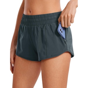 CRZ YOGA Low Waisted Running Shorts for Women 2.5″ – Mesh Liner Quick Dry for Workout Sport Athletic with Zipper Pocket(Melanite)