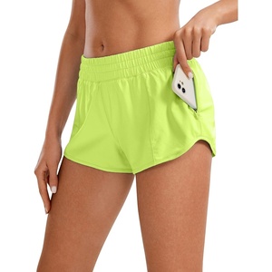 CRZ YOGA Low Waisted Running Shorts for Women 2.5″ – Mesh Liner Quick Dry for Workout Sport Athletic with Zipper Pocket(Neon Yellow)