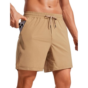 CRZ YOGA Mens Lightweight Workout Shorts 7″ – Quick Dry for Gym Athletic Workout with Zipper Pocket(Khaki Sand)