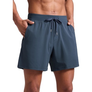 CRZ YOGA Mens Texture Training Shorts 5″ – Side Split Quick Dry Lightweight for Workout Running with Zipper Pocket(Stelindigo)