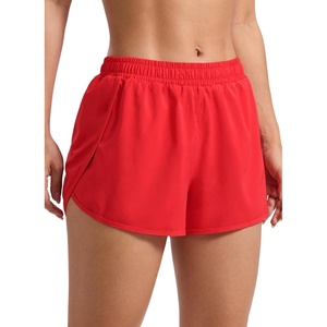 CRZ YOGA Mid Rise Half Split Athletic Shorts for Women 2.5″- Dolphin Quick Dry for Gym Running Workout Track(Deep Red)