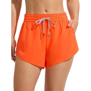 CRZ YOGA Relaxed Fit Dolphin Board Shorts for Women 3.5″ – High Waisted Swim Beach Bathing Trunks Bottoms with Liner(Neon Orange)