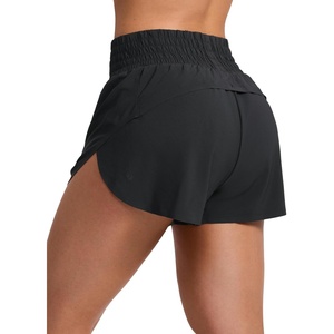 CRZ YOGA Split Dolphin Running Shorts for Women 2.5″ – Curved Back High Waisted Quick Dry for Athletic Workout Gym Track(Black)