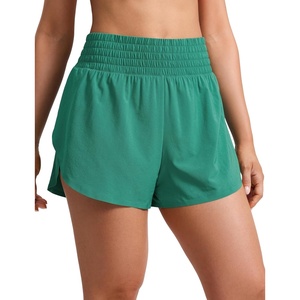 CRZ YOGA Split Dolphin Running Shorts for Women 2.5″ – Curved Back High Waisted Quick Dry for Athletic Workout Gym Track(Cascadia Green)
