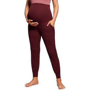 CRZ YOGA Butterluxe Maternity Joggers Pockets 27″ – Workout Active Yoga Pregnancy Womens Pants Over The Belly Soft(Red Merlot)